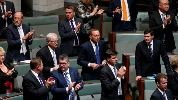 Former prime pinister Tony Abbott and former defence minister Kevin Andrews after Treasurer Scott Morrison delivered the budget speech.