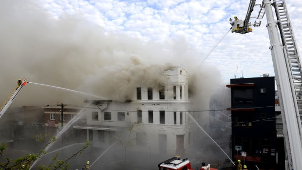 Firefighters battle the blaze at the Albion Hotel in October 2015.