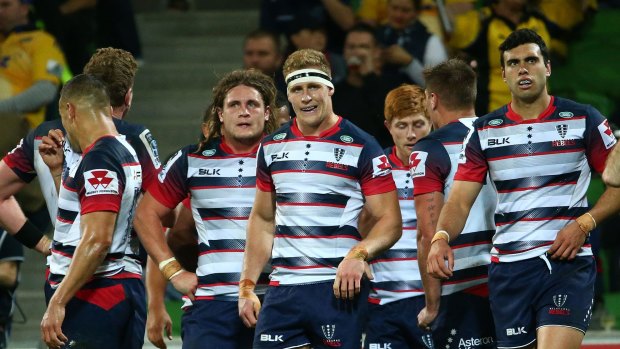 Much room for improvement: The Rebels look on after the Hurricanes scored a try.