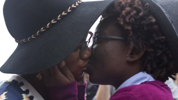 Tori Sisson, left, and Shante Wolfe kiss after saying their marriage vows in Montgomery, Alabama in February, 2015. Sisson and Wolfe were the first same-sex couple in the state to file their marriage licence. 