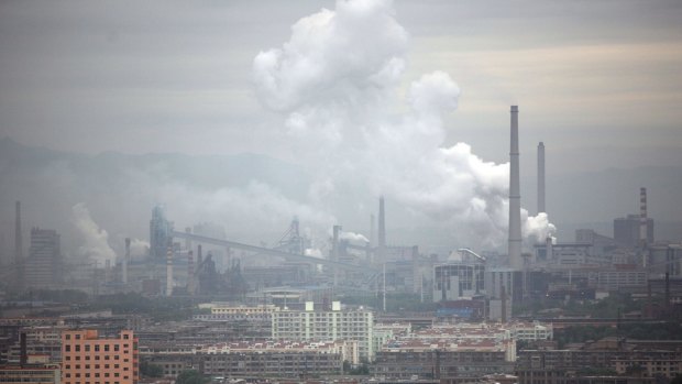 A coal-fired power plant spews emissions in Taiyuan, Shanxi, China. There has been a small reduction in emissions of man-made greenhouse gases in 2015.