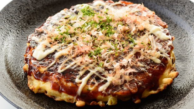 Okonomiyaki is a delicious mess of a thing.