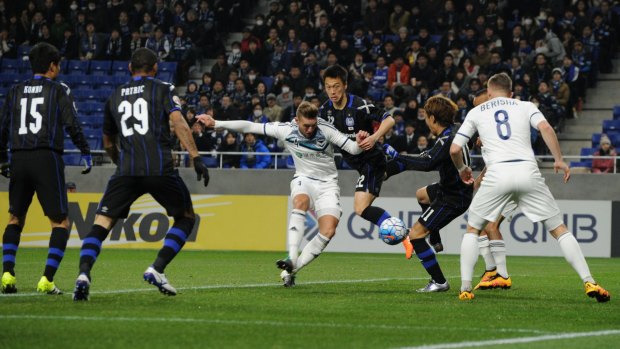 Nicholas Ansell of Melbourne Victory scores during the AFC Champions League Group G match against Gamba Osaka in Osaka on Wednesday night.