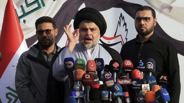 Shiite cleric Muqtada al-Sadr, speaks to his supporters and Arab media before entering the highly fortified Green Zone during protests in March.