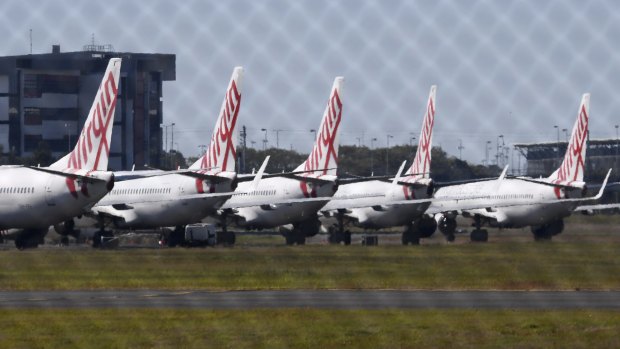 Virgin Australia planes parked at Brisbane Airport.