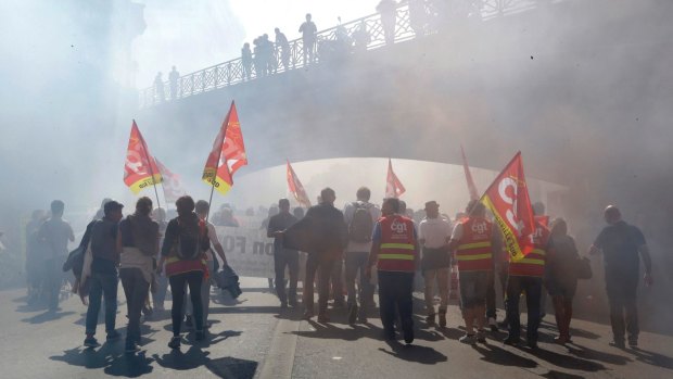 Workers demonstrate against changes to labour laws, in Marseille.
