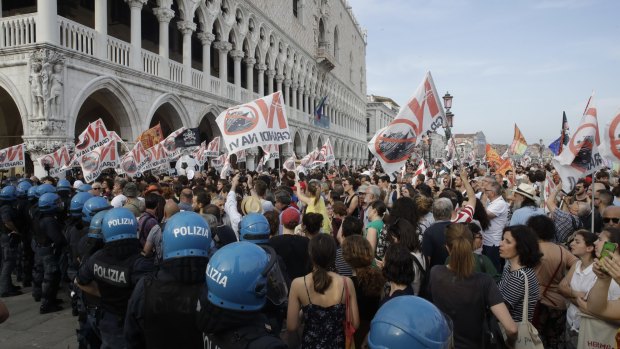 Demonstrators gather near St. Mark's Square during a protest against cruise ships last month. 