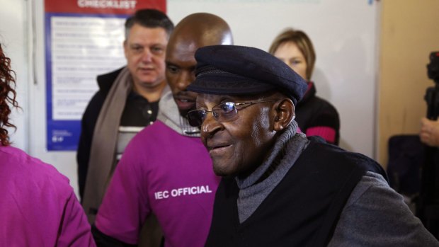 South African archbishop and anti-apartheid icon Desmond Tutu  at a polling station in Cape Town.