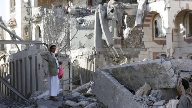 A man stands amid the rubble of a house destroyed by an air strike of the Saudi-led coalition in Sanaa, Yemen, earlier this month.