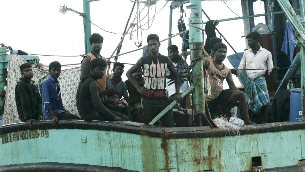 Sri Lankas wait for help from the Indonesian government after their wooden boat drifted in Aceh sea last week.