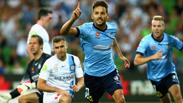 Milos Ninkovic of Sydney celebrates after scoring one of his two goals.