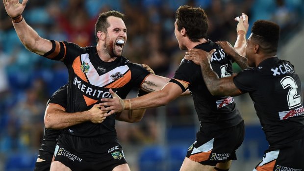 Game breaker: Pat Richards celebrates his winning kick against the unlucky Titans.