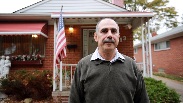 Haisam Farran in front of his home in Dearborn Heights, Michigan.