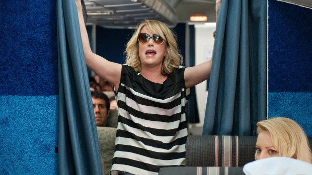 Kristen Wiig as Annie Walker in Bridesmaids, another bridesmaid who was kicked out of the wedding party. 