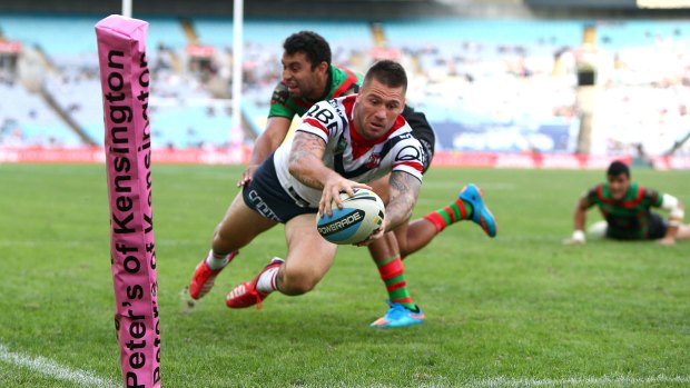 New home? Shaun Kenny-Dowall scores a try against South Sydney at ANZ Stadium.