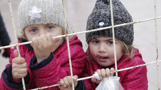 Syrian children wait to return to their homeland at the Turkish border crossing with Syria in Kilis, Turkey, this week. 