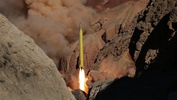A Qadr H long-range ballistic surface-to-surface missile is fired by Iran's Revolutionary Guard in March 2016. The US has tried to tie resumed sanctions to missile testing - which is not part of the nuclear deal. 