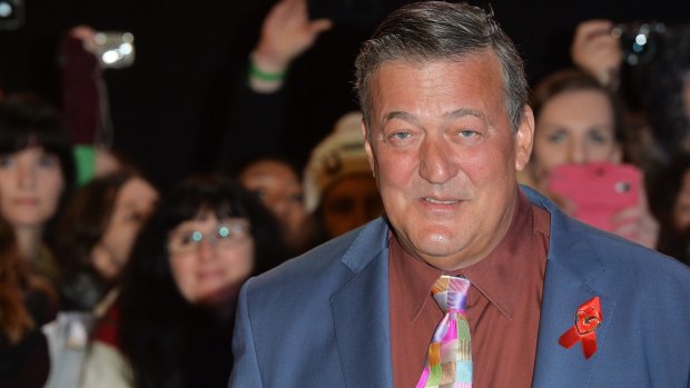 Cat out of bag: Actor and presenter Stephen Fry, 57, has given formal notice to marry partner Elliott Spencer, 27, at a register office in Dereham, Norfolk.