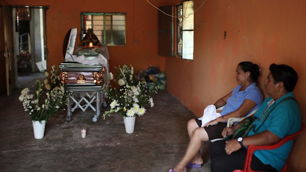 Family members accompany the coffin of Rosalba Vazquez killed by the powerful earthquake in Juchitan, Oaxaca state, Mexico.