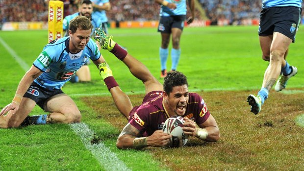 Hat trick hero: Dane Gagai scoring one of his three tries. 