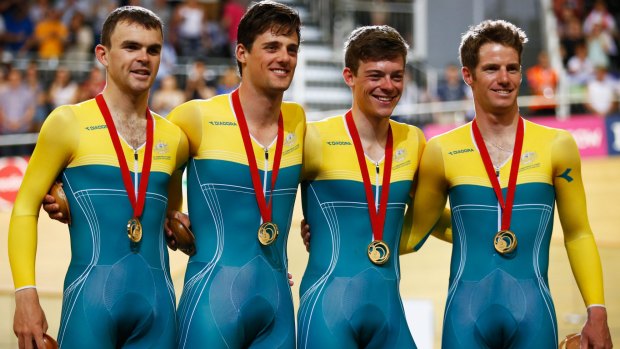 Alex Edmondson (second from right) with Jack Bobridge, Luke Davison, and Glenn O'Shea after winning the men's 4000 metres team pursuit final at the Glasgow Commonwealth Games in July 2014.