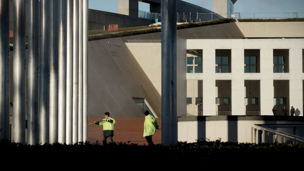 Maintenance workers at Canberra's Parliament House, which is set for a three-year, $29 million 'renewal' program.