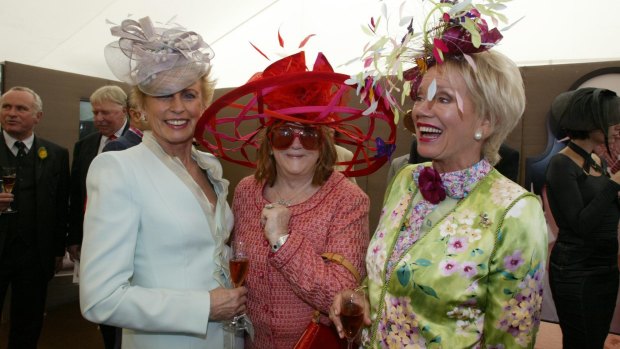 Lady Sonia McMahon, Eileen Bond and Lady Susan Renouf in the Moet tent in the Birdcage. 