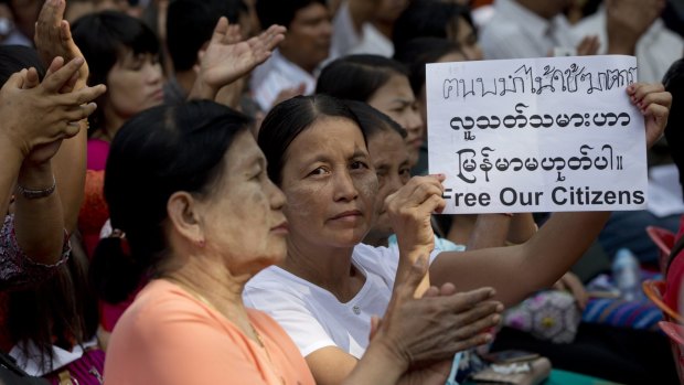 Myanmar citizens rallying against a Thai court's verdict sentencing two Myanmar migrant workers to death for the murder of British backpackers Hannah Witheridge and David Miller. 