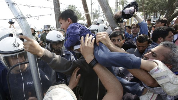 Migrants and police crash at the closed border with Macedonia, in Idomeni, Greece last week.