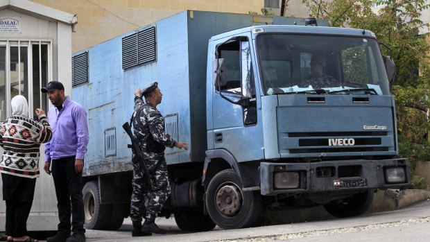 A police truck transports Sally Faulkner and Channel 9 presenter Tara Brown to Baabda Women's Prison in south-eastern Beirut on Wednesday.