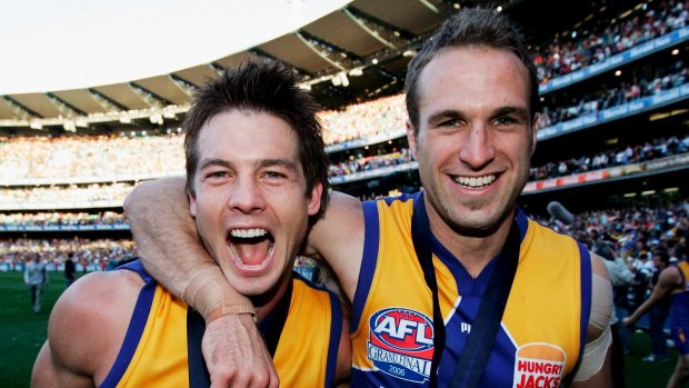 Chris Judd and Ben Cousins celebrate West Coast's 2006 premiership.