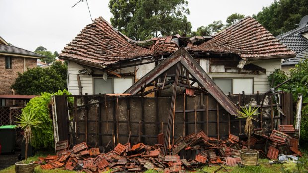 This home in Champion Street, Tennyson, collapsed from the heavy rain.