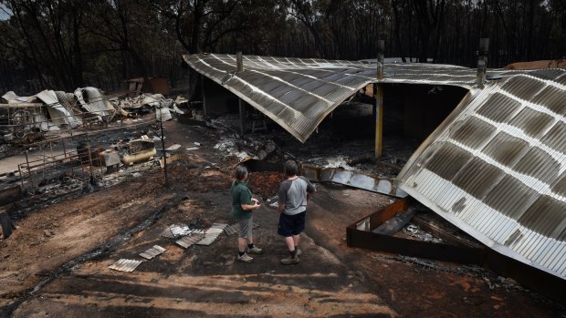 Shane and Gianna Hogarth return to their home on Masons Gap Road.