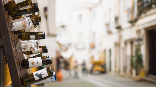 Empty wine bottles in the streets of Evora.