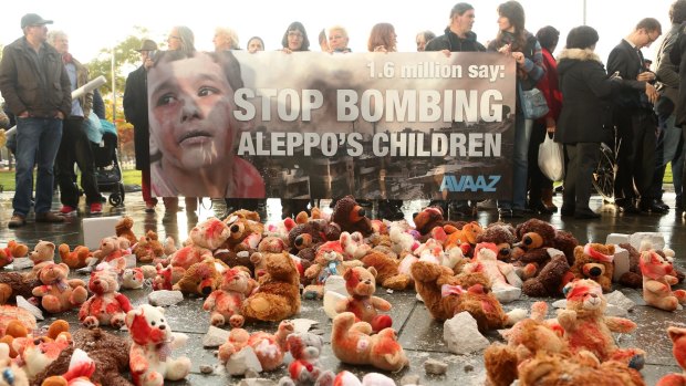 Bloodied teddy bears are seen during a demonstration against Russian military operations in Syria in Berlin in October 2016.