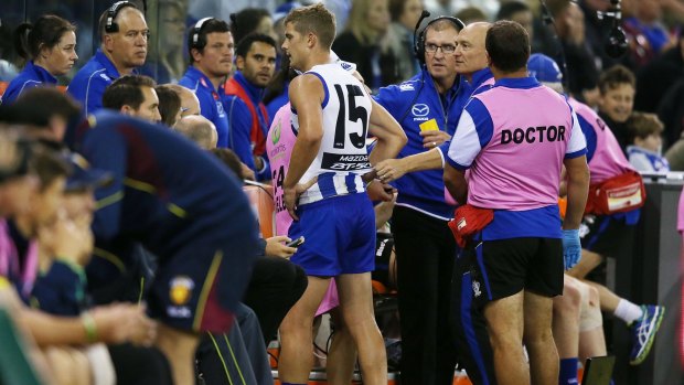 Nick Dal Santo comes off with a hamstring injury during the match against the Brisbane Lions.