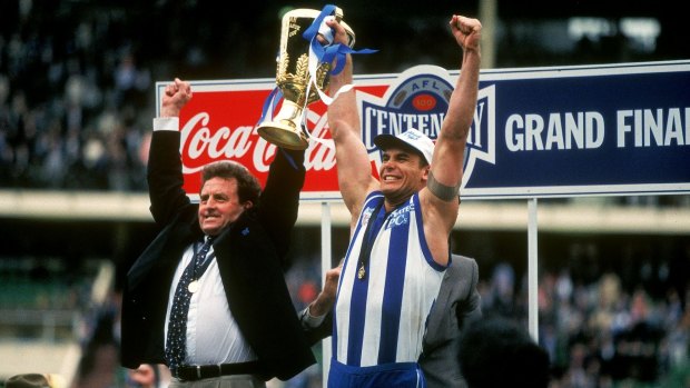 Denis Pagan and Wayne Carey hold the 1996 premiership cup aloft.
