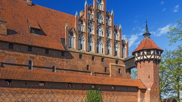 Malbork Castle, the 13th-century, brick-built headquarters of the Teutonic Knights, is one of the world's largest castles.