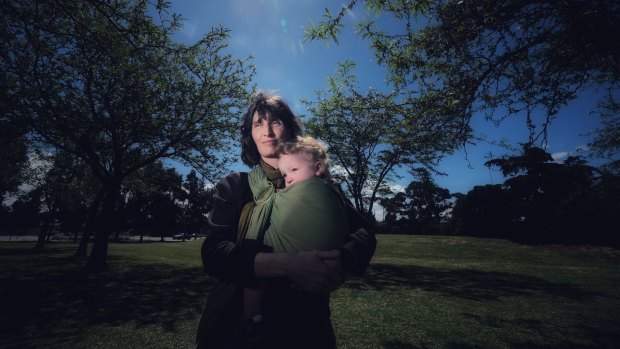 Christine Harris, with two-year-old son Daniel, is worried about the effects of pollution from the tunnel near their local park.