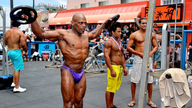 Bodybuilders can be seen working out at Muscle Beach in Venice, California.