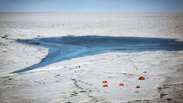 The researchers' camp near a supraglacial lake and river on the Greenland ice sheet in July. 