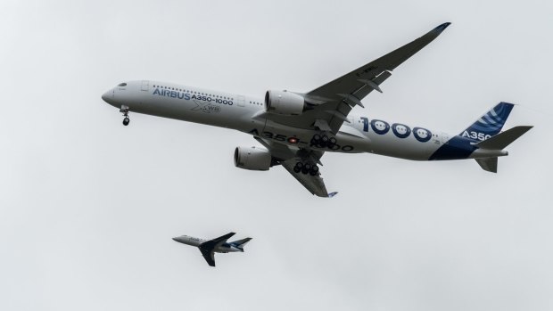 The Airbus A350-1000 makes its first flight.