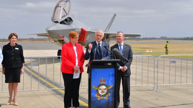 Malcolm Turnbull, Marise Payne and Christopher Pyne with the F-35 Joint Strike Fighter at Avalon. Lockheed Martin chief executive Marillyn Hewson on the left.