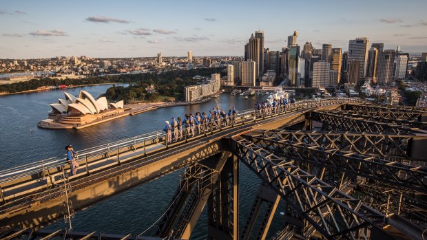 Climbers at the top of the arch are 136 metres above Sydney Harbour.