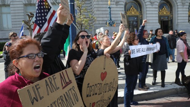 Demonstrators in support of the national strike outside City Hall in San Francisco on Friday.