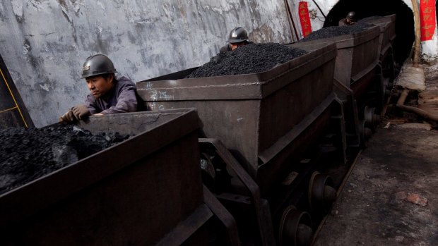 China is to give its miners a 40 per cent tax cut to help them deal with falling iron ore prices.