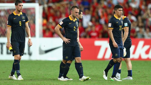 Taking full responsibility: Ivan Franjic and fellow Socceroos after losing to South Korea.
