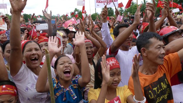 Supporters of Myanmar opposition leader Aung San Suu Kyi's National League for Democracy cheering at a rally on Sunday. 