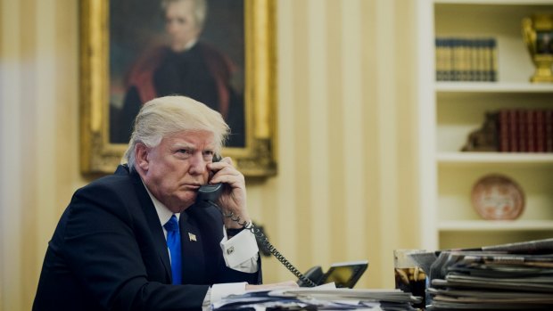 US President Donald Trump speaks on the phone with Malcolm Turnbull on Sunday morning. 