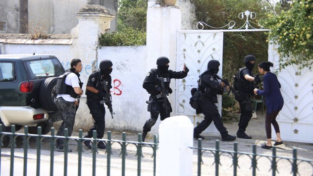 Tunisian special forces take up positions near the Bouchoucha military base.